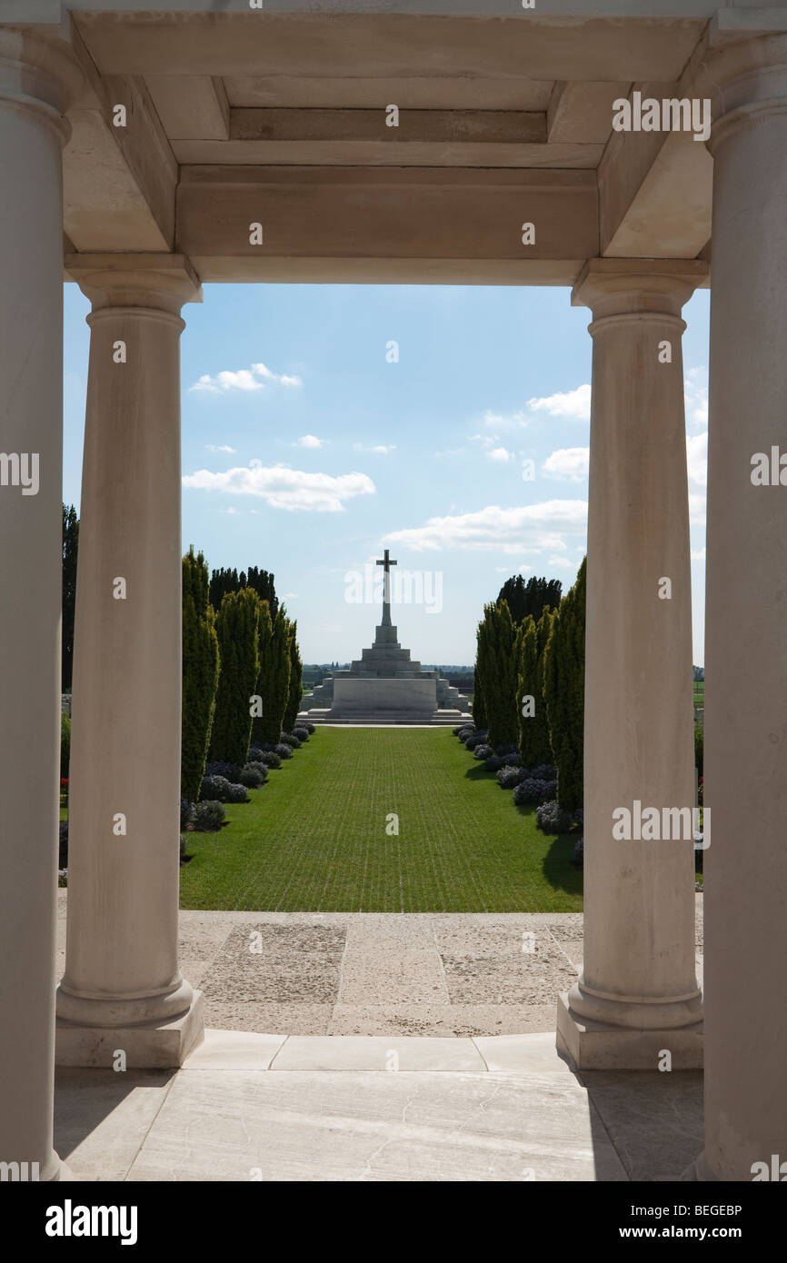 View over Tyne Cot Military Cemetery to the Cross of Sacrifice. First World War British cemetery with 11,856 white tombstones. Stock Photo