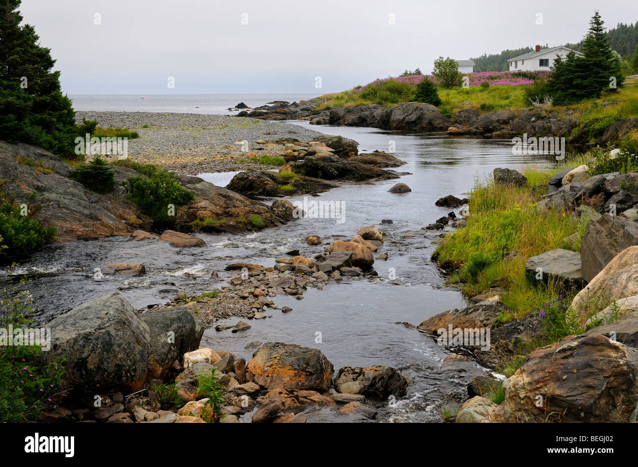 House in early morning on Mobile Bay and Mobile River emptying into Atlantic ocean at Avalon Peninsula Newfoundland Stock Photo