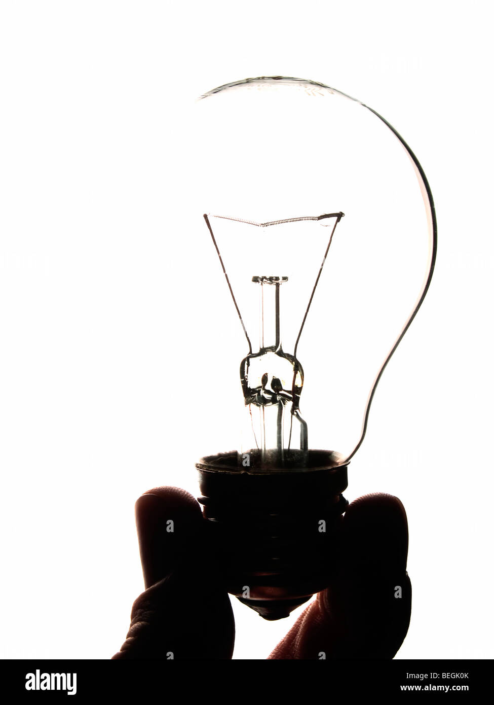Light bulb in man's hand on white background isolated Stock Photo - Alamy