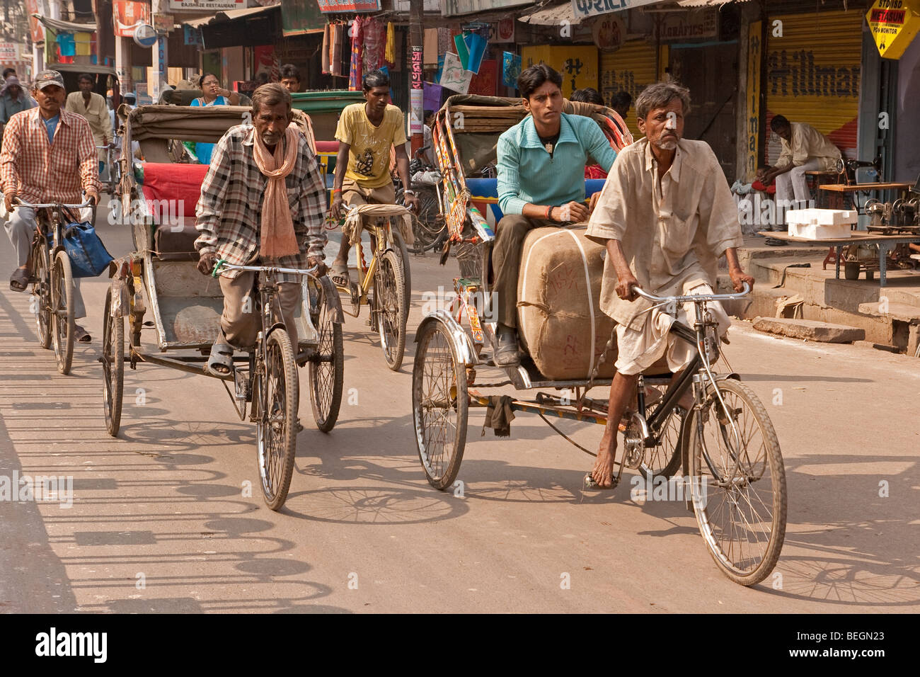 Busy roads full of cycle rickshawas at Godolia in Varanasi city, India Stock Photo