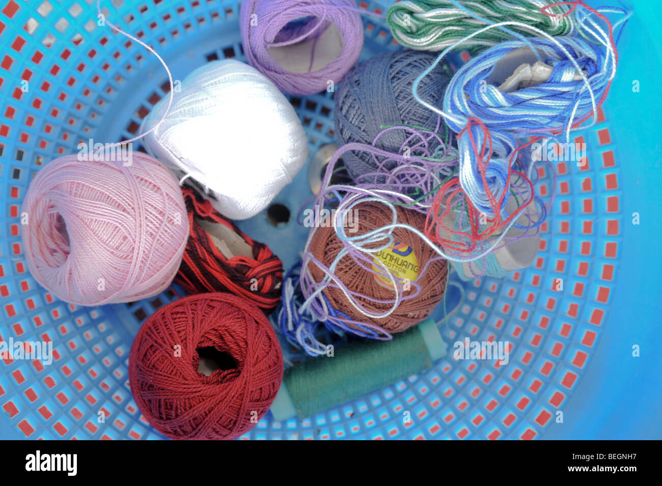 Sewing threads of different colours Stock Photo - Alamy