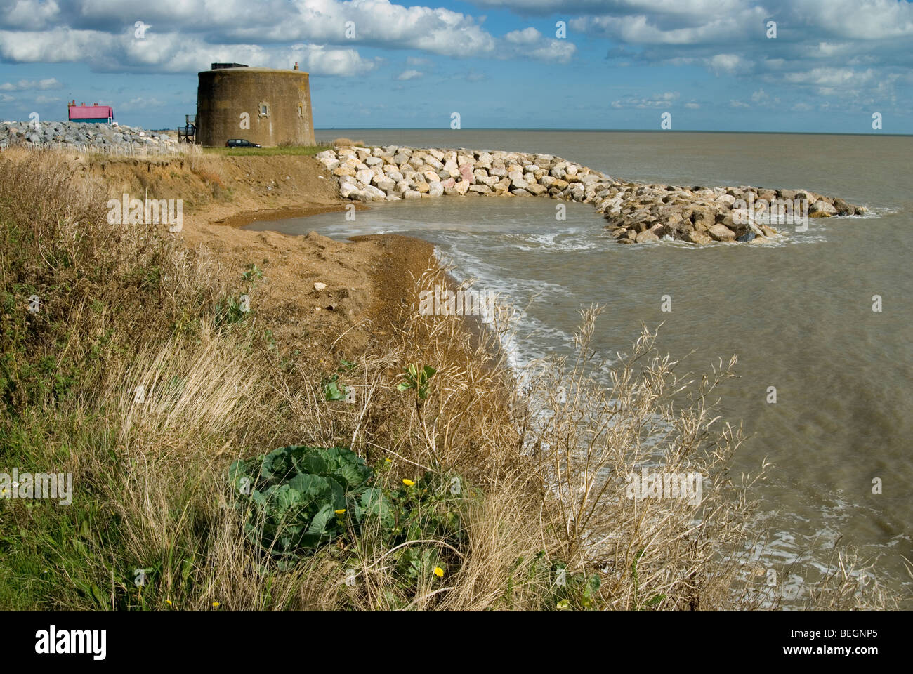 Bawdsey Martello tower with coastal erosion protection Stock Photo