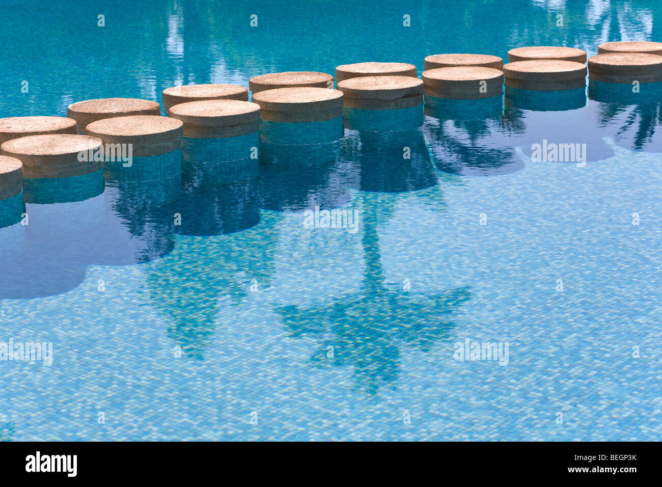 Stepping stones in a 'swimming pool' Stock Photo