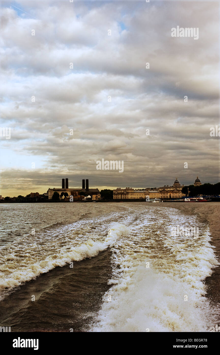 The wake of a power boat as it leaves Greenwich in London. Stock Photo