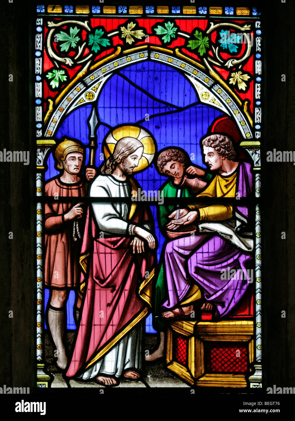 A stained glass windowby William Warrington depicting Jesus Christ before Pontius Pilate, Church of St Mary the Virgin, Gunthorpe, Norfolk Stock Photo