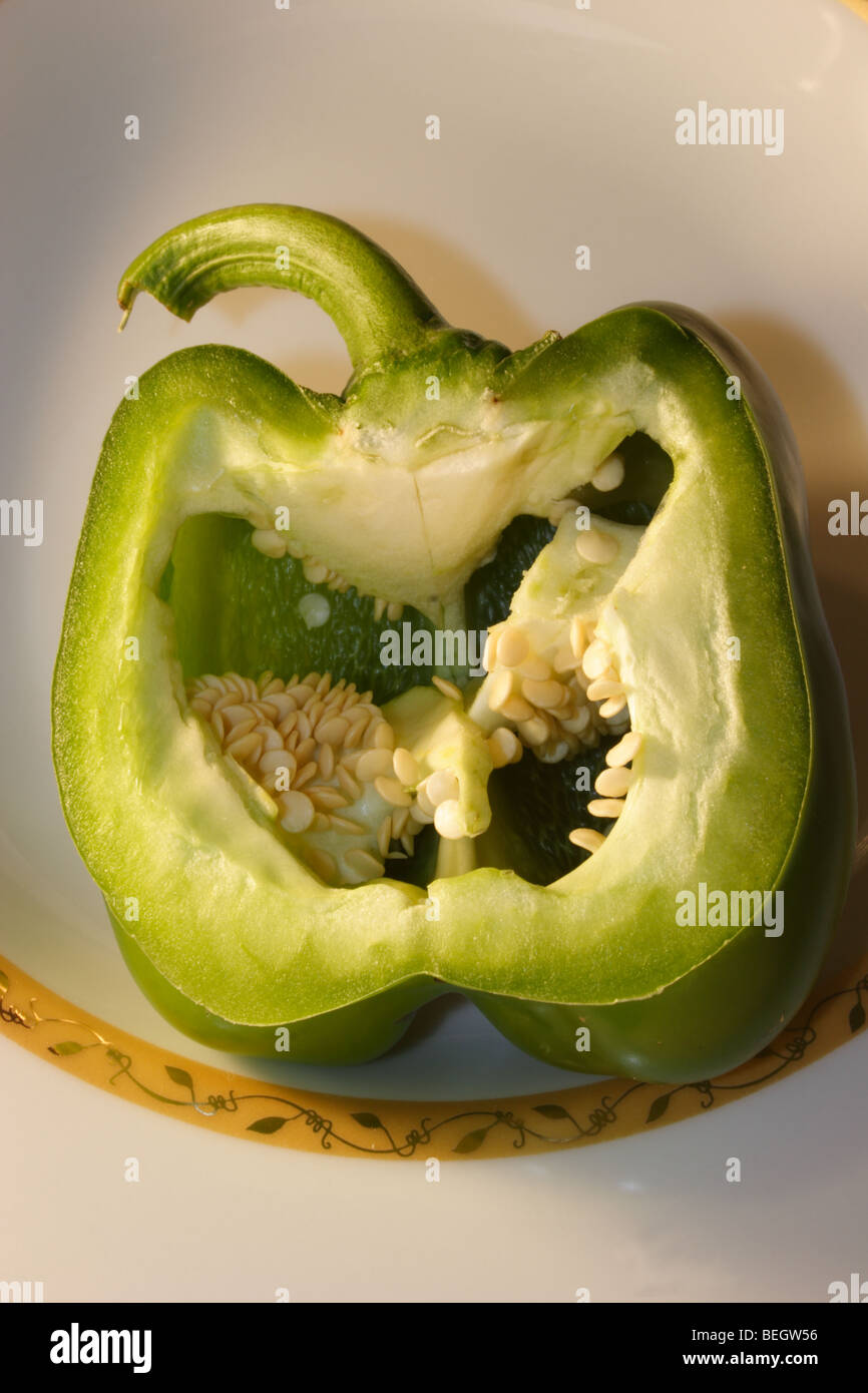 Sliced green bell pepper being prepared for meal Stock Photo Alamy