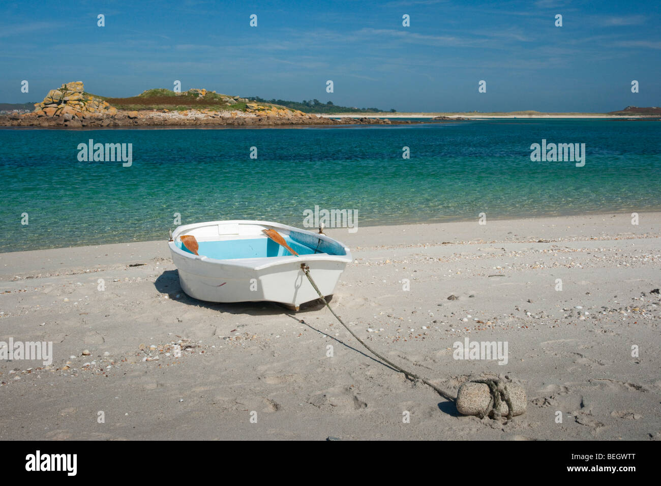 Dingy pulled up on the beach on Samson, Isles of Scilly Stock Photo