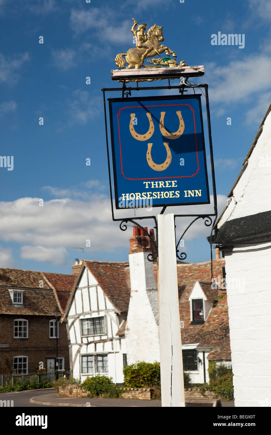 England, Cambridgeshire, Huntingdon, Houghton village green, three horseshoes pub sign Stock Photo
