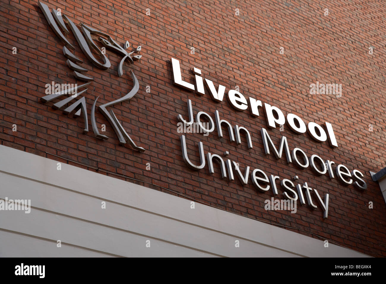 logo for liverpool john moores university on a university wall merseyside liverpool england uk Stock Photo