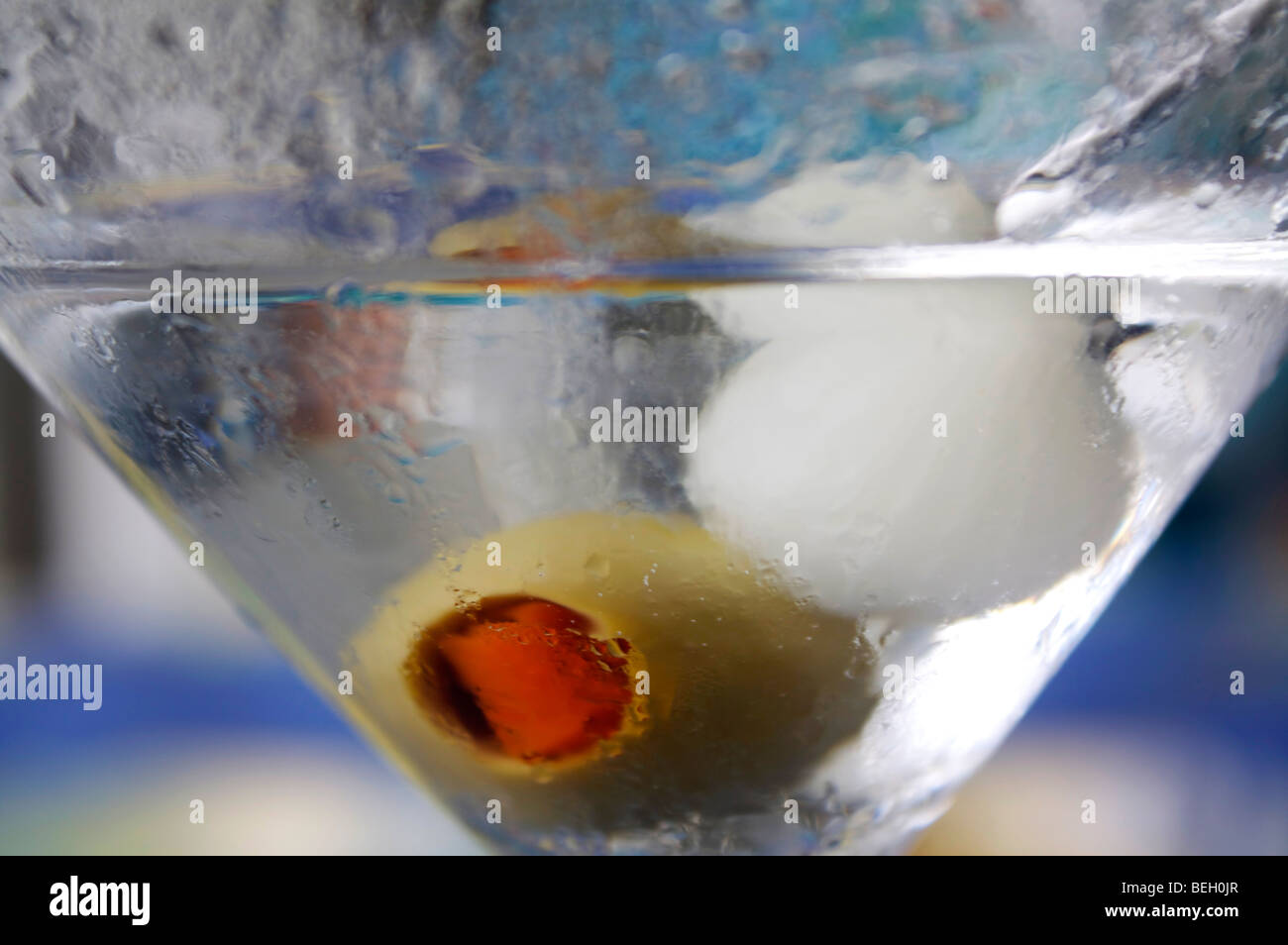 Martini with olive and onion Stock Photo Alamy