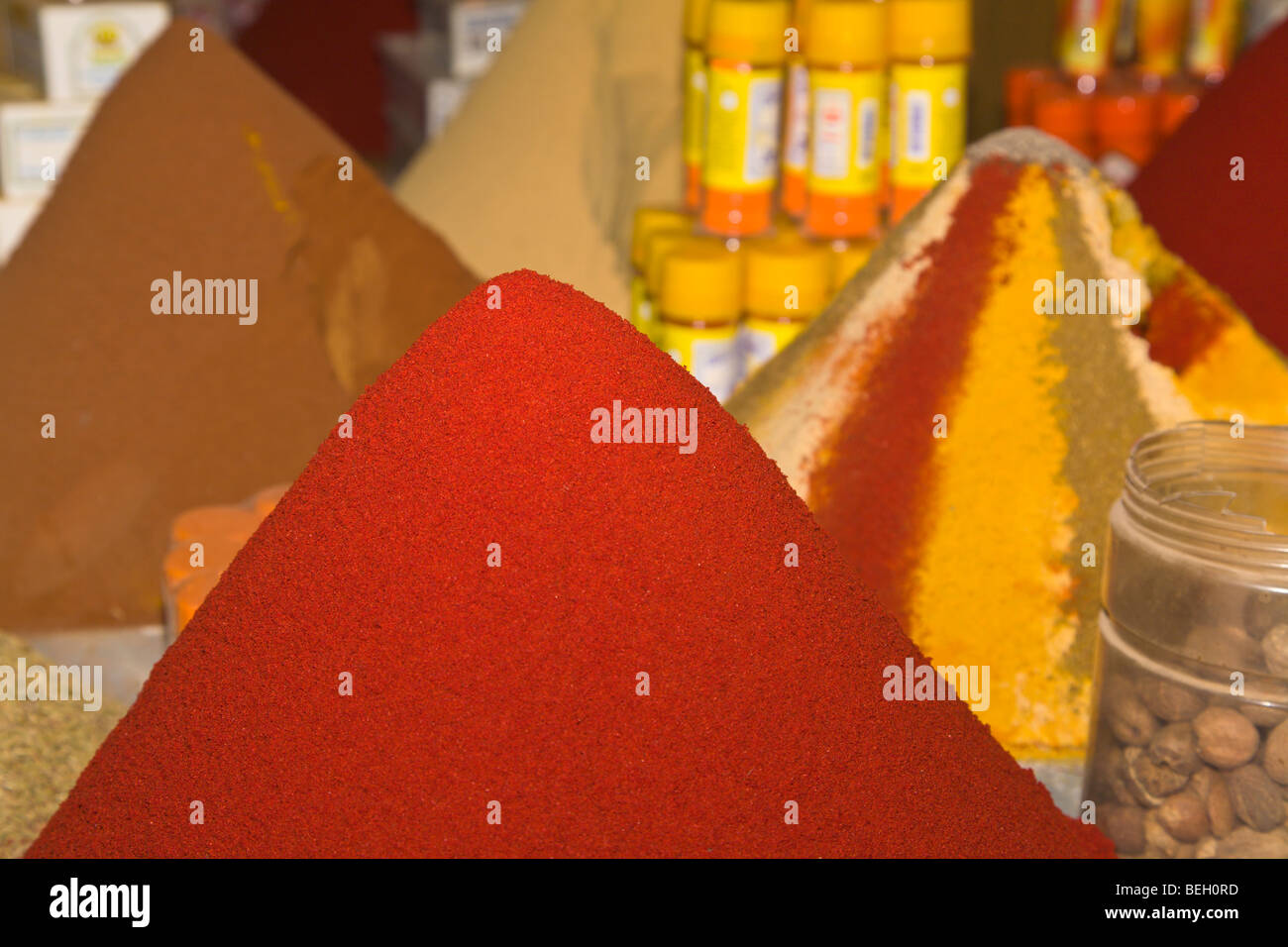 Pyramids of ground spices at the souk in Taroudant Morocco Stock Photo