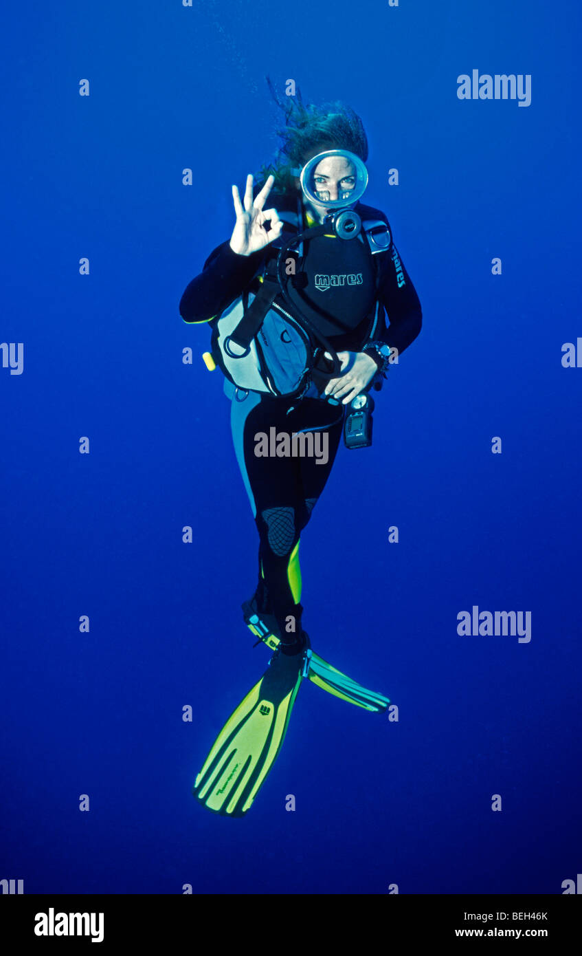 Diver shows OK Sign Stock Photo