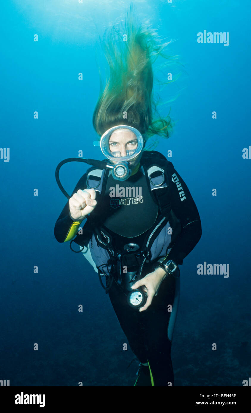 Diver shows 50 bar Stock Photo