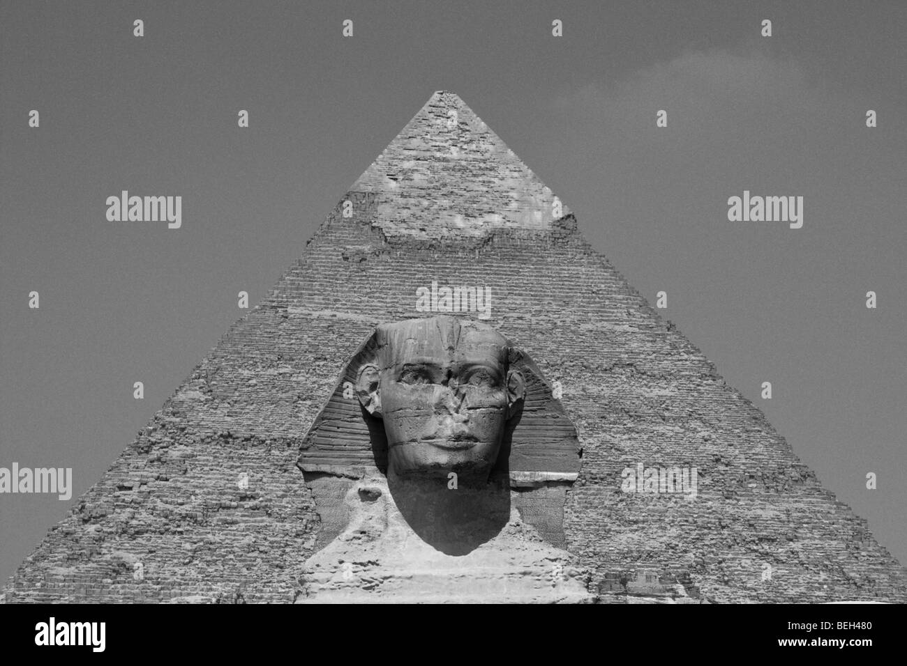 Great Sphinx of Giza against Khafra Pyramid, Cairo, Egypt Stock Photo