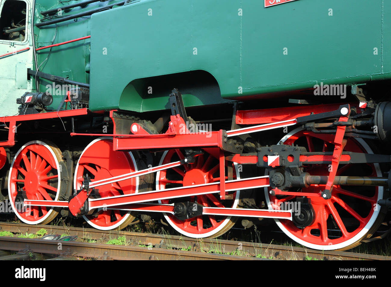Steam engine steel red wheels and propulsion mechanism Stock Photo - Alamy