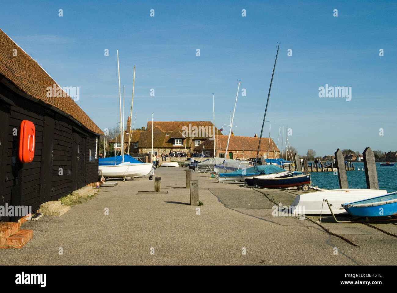 Bosham Yacht Club with boats laid up on the hard Stock Photo Alamy