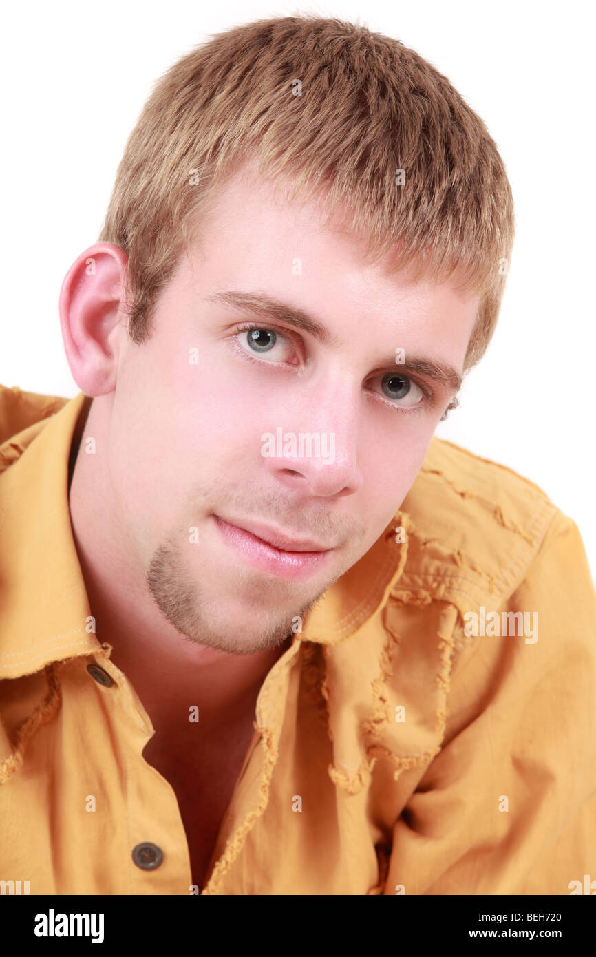 Portrait of young man with facial hair, studio shot Stock Photo