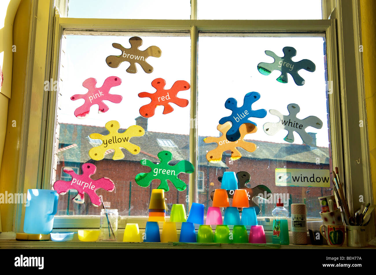 Colour stickers on Primary school window Stock Photo