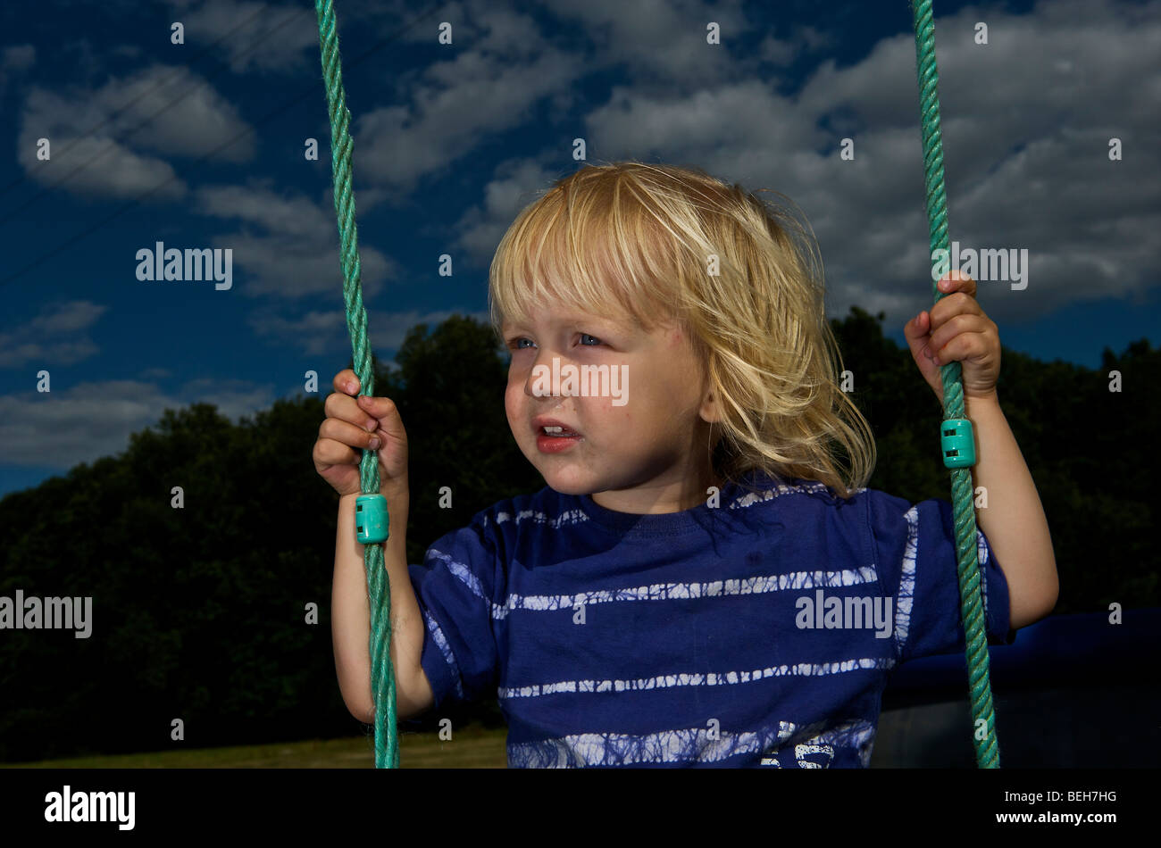 Toddler on a swing Stock Photo