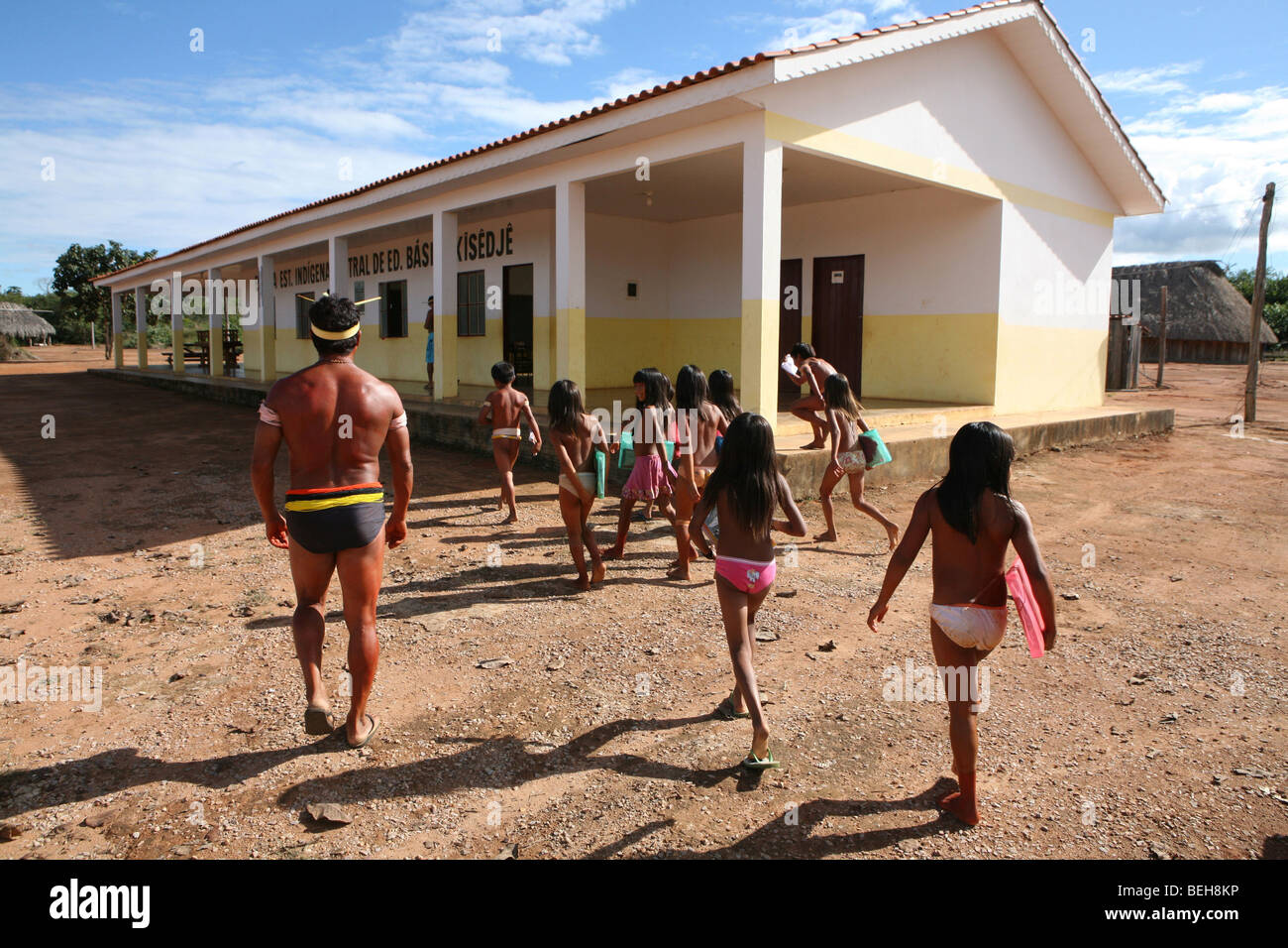 Children of the Xingu Indian go to school built in the village by the ministry of education. It is tradition to go in traditiona Stock Photo