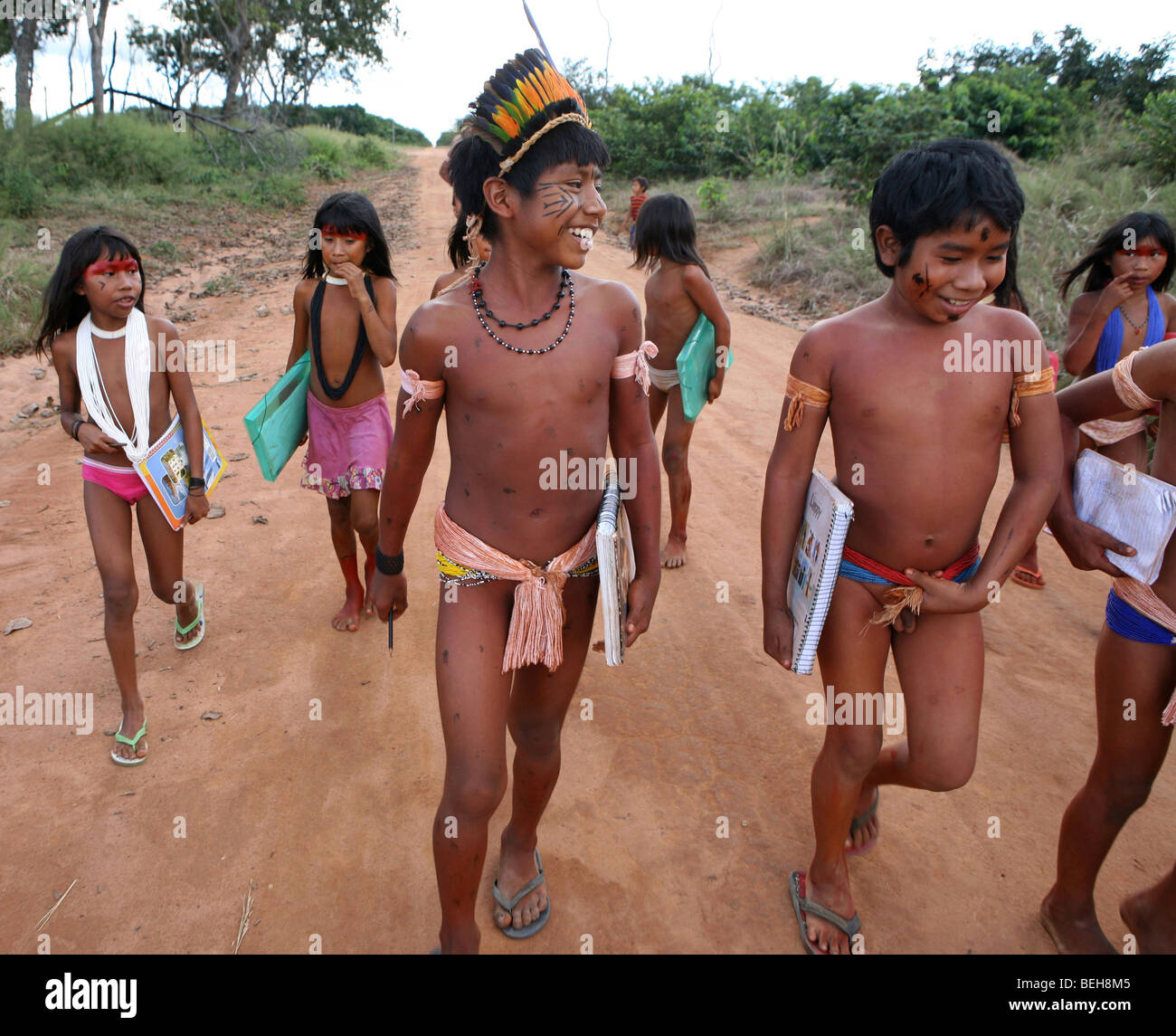 Children of the Xingu Indian go to school built in the village by the ministry of education. It is tradition to go in traditiona Stock Photo