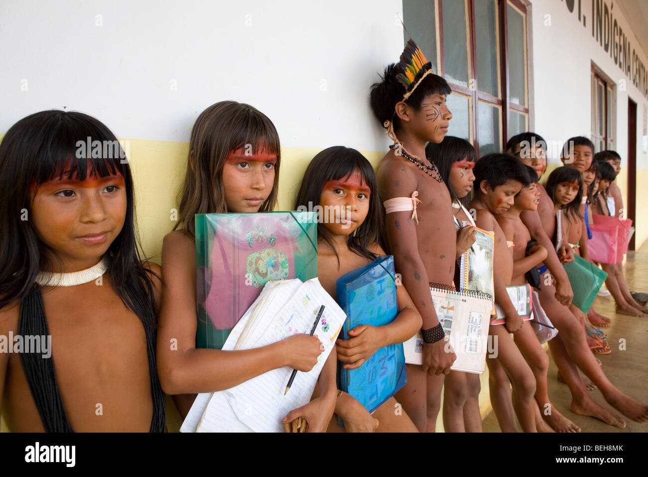 Children of the Xingu Indian go to school built in the village by the ministry of education. It is tradition to go in traditiona Stock Photo