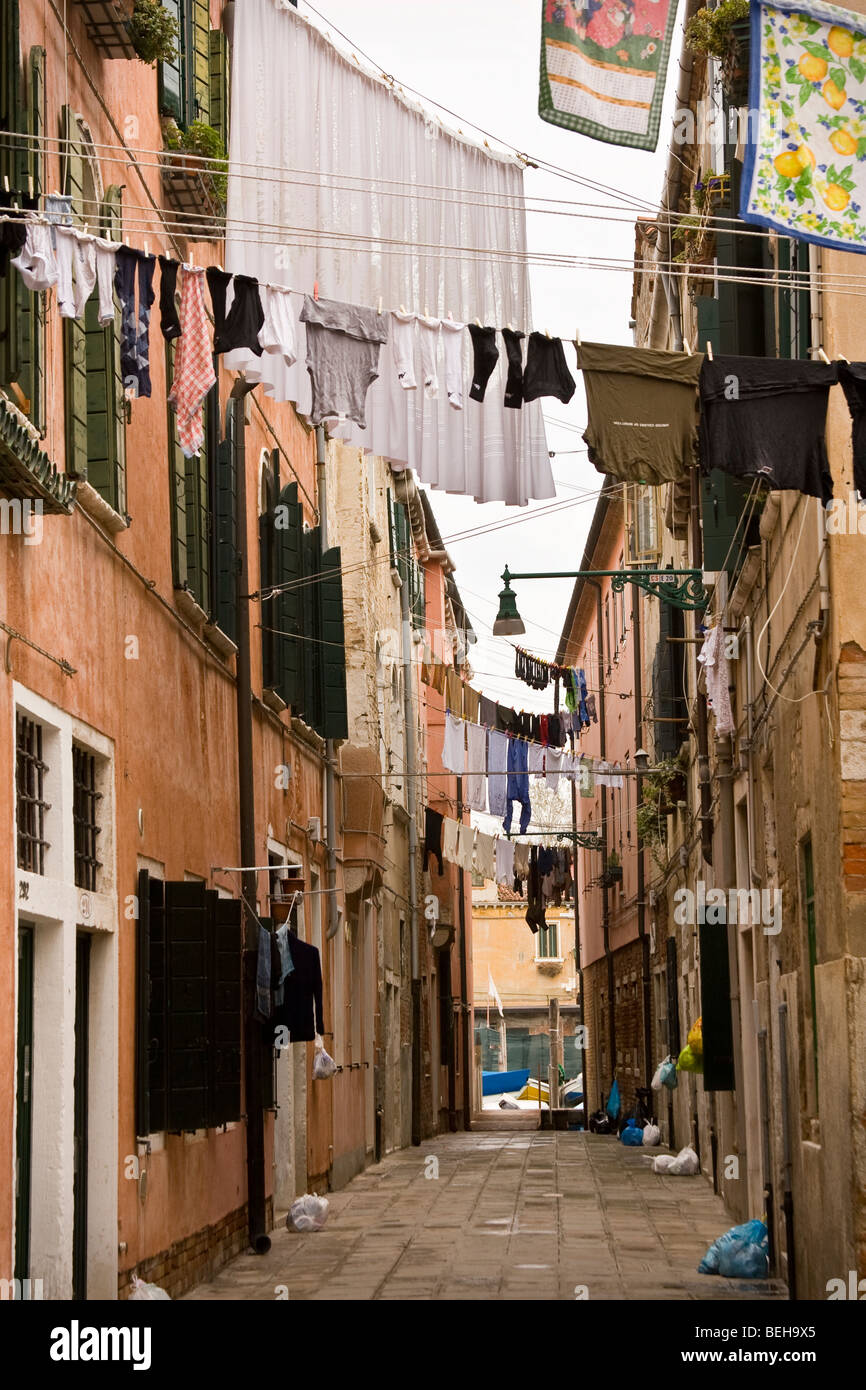 Laundry between old houses Castello Venice Stock Photo Alamy
