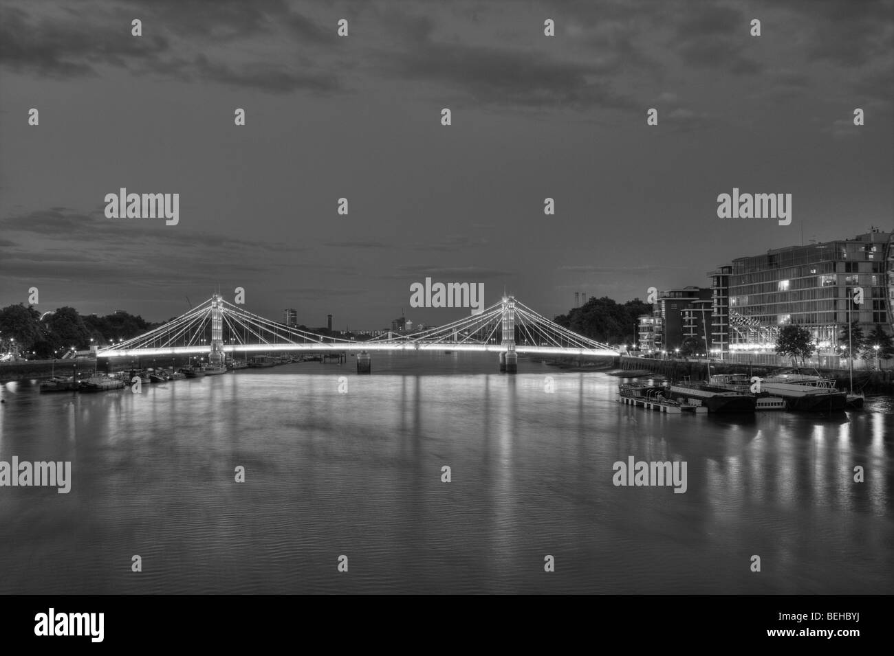 Albert Bridge and the river Thames, at night Stock Photo