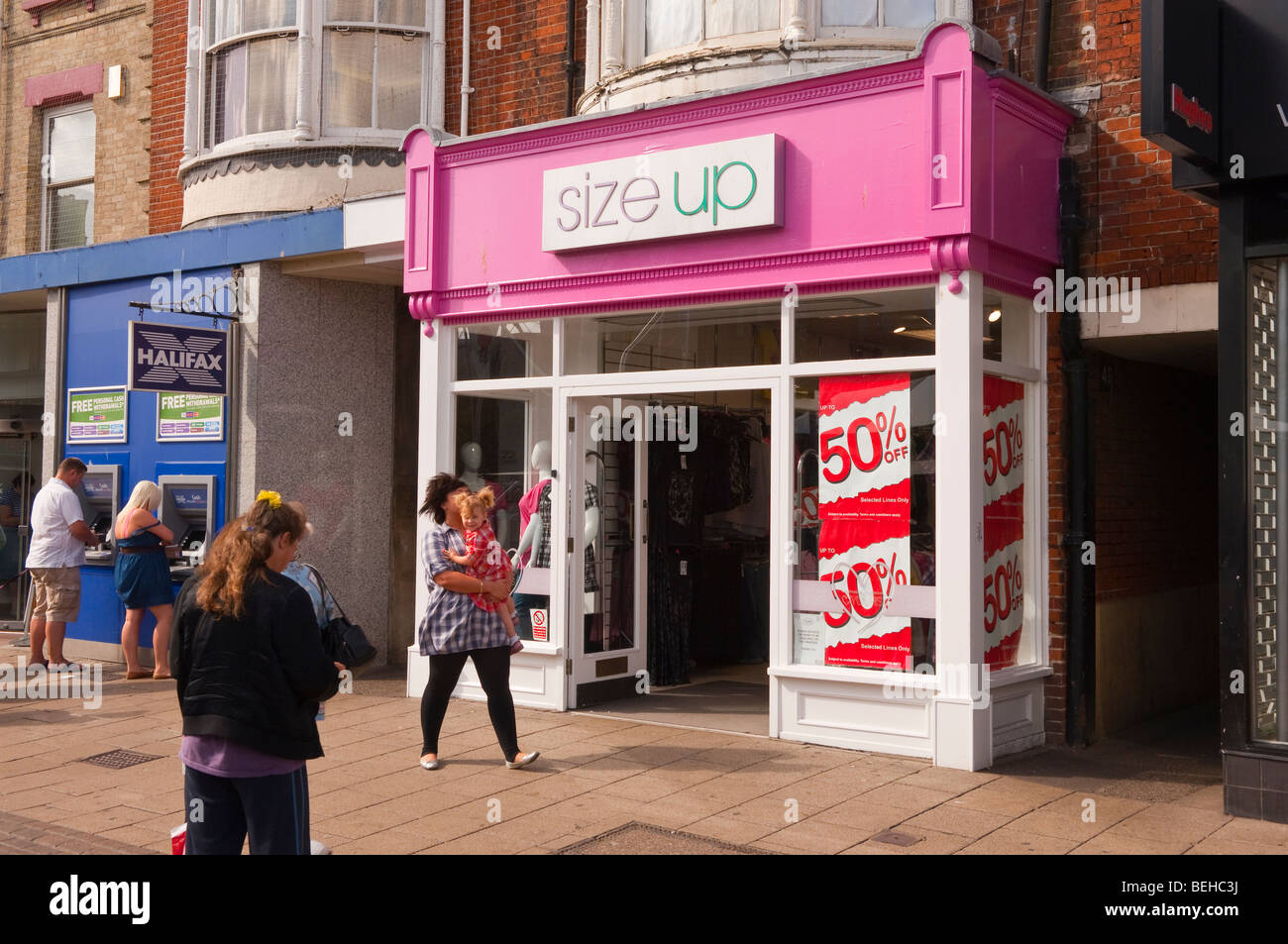 Size up shop store selling womens large sized clothes in Great Yarmouth , Norfolk , Uk Stock Photo