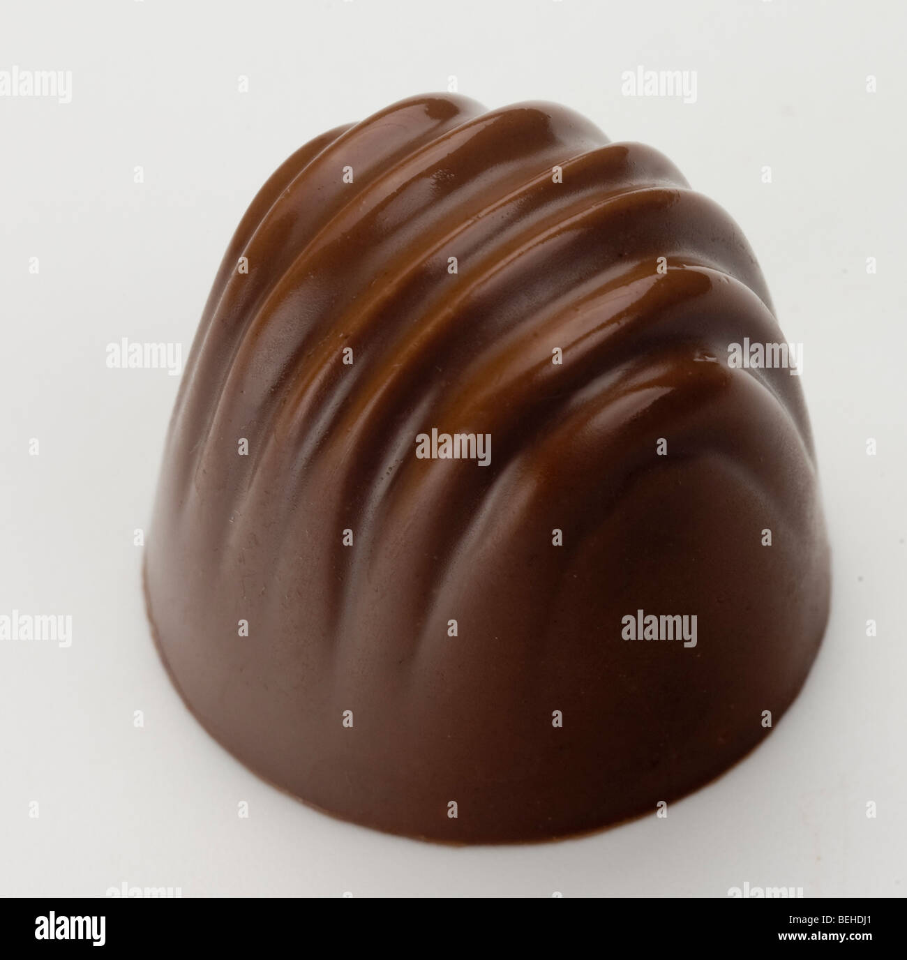single gourmet milk chocolate praline Stock Photo Alamy