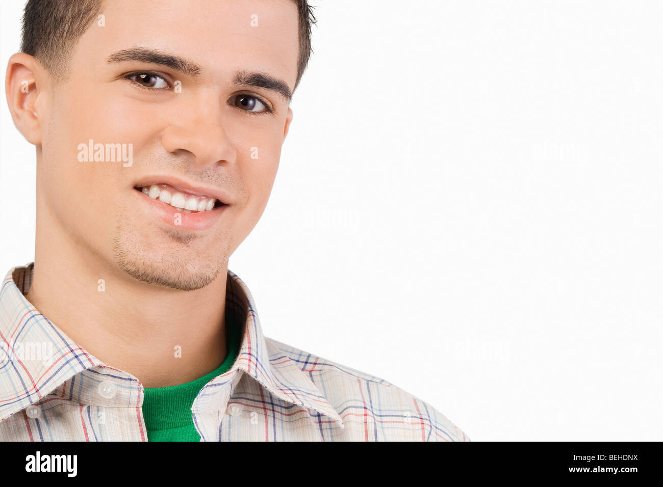 Portrait of a young man smiling Stock Photo - Alamy