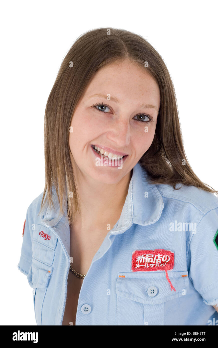 Studio portrait of a young girl smiling Stock Photo - Alamy