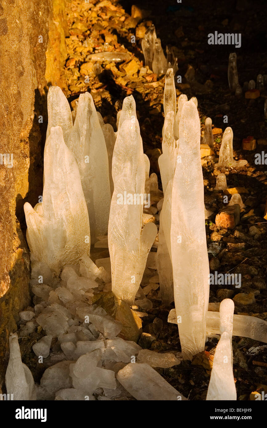 stalactite icy snow stalagmite cave winter ice wet Stock Photo