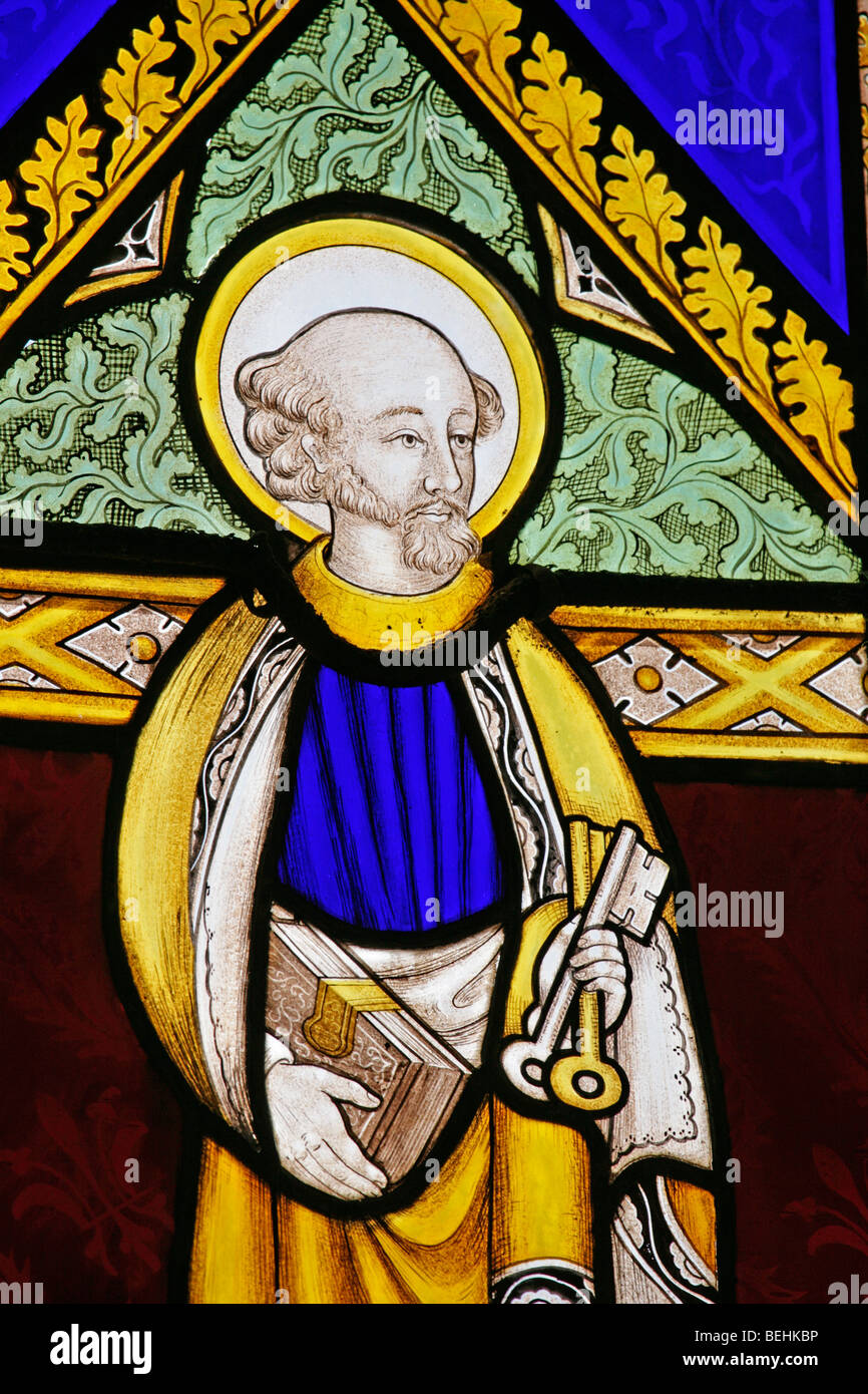 A stained glass window depicting St Peter the Apostle holding the keys to Heaven, All Saints Church, Wighton, Norfolk by Joseph Grant of Costessey Stock Photo