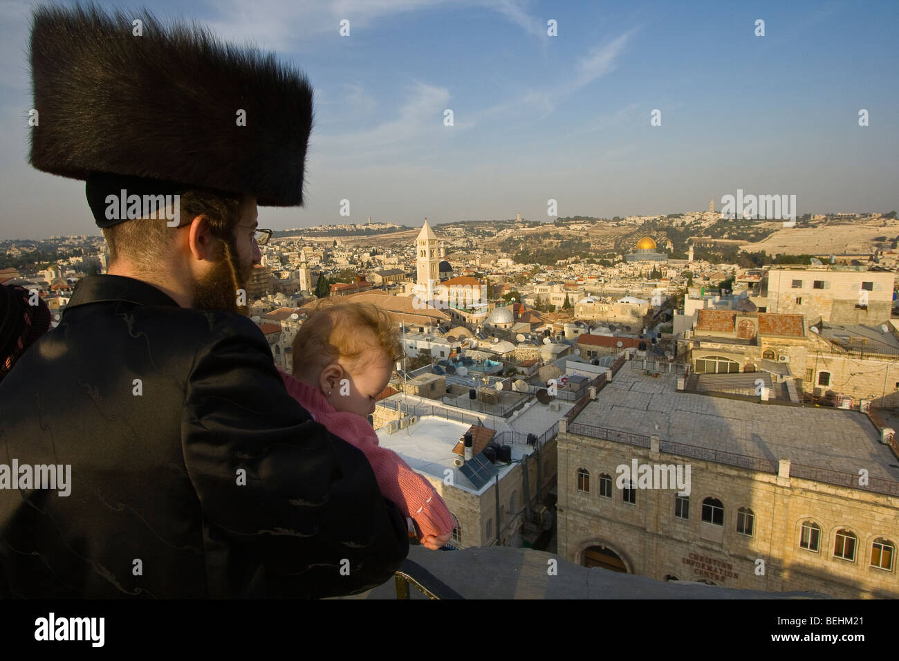 Hasidic Jewish Man and Baby looking at the Dome on the Rock in the Old City of Jerusalem Stock Photo