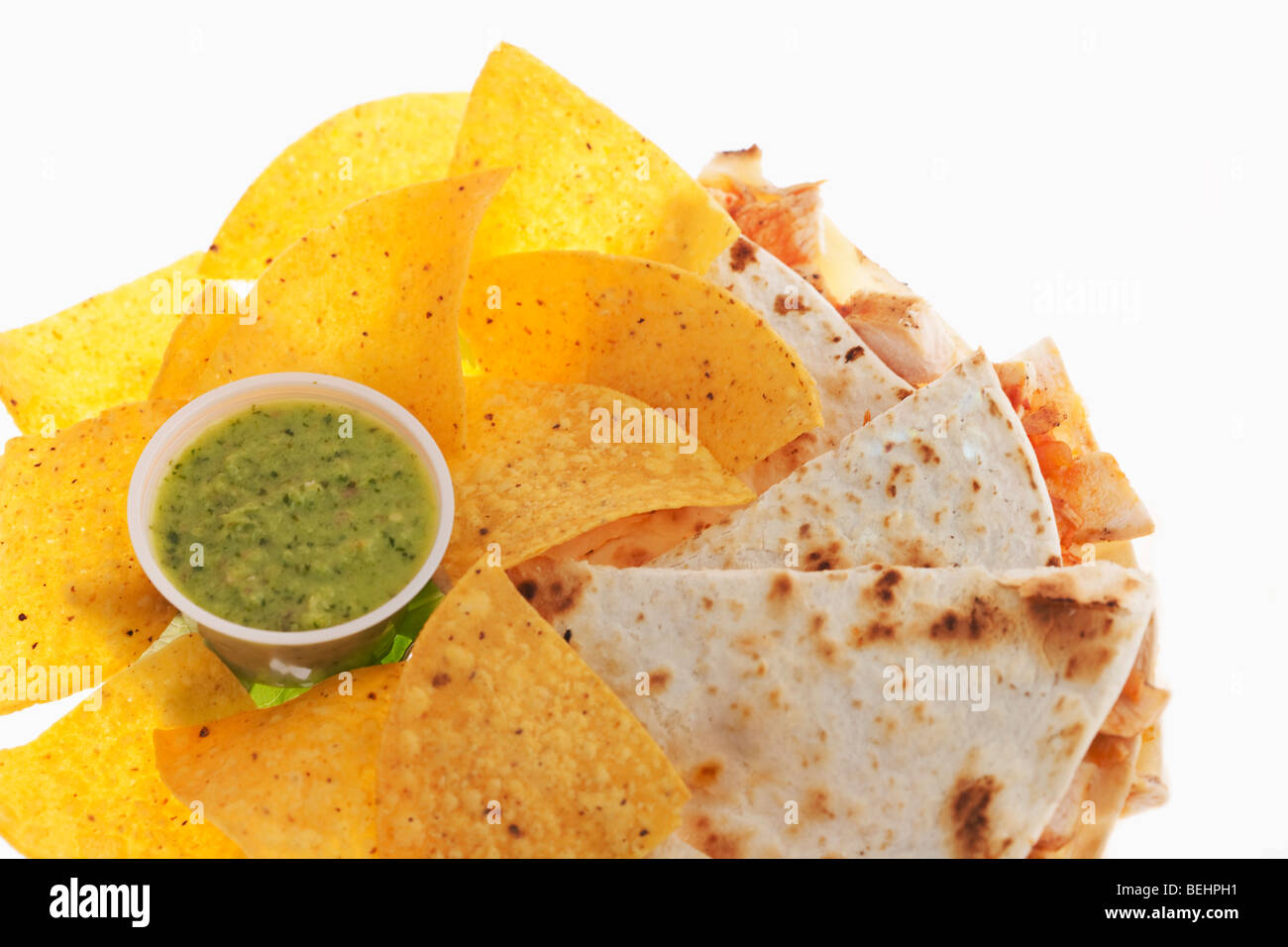 Close-up of quesadillas with tortilla chips and salsa verde Stock Photo