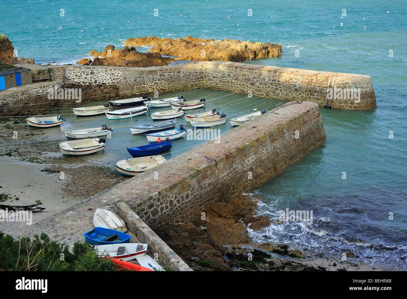 Little boats at Port Racine, the smallest harbour in France at Saint-Germain-des-Vaux, Normandy Stock Photo