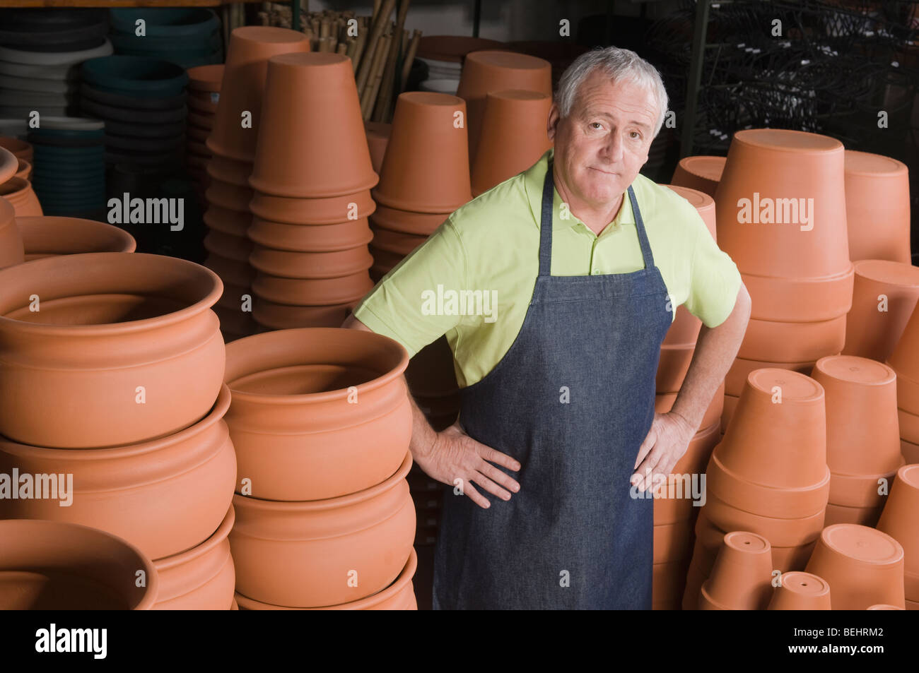 Portrait of a man working in a garden center Stock Photo