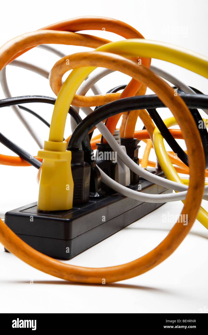 Power cords plug into a surge protector Stock Photo Alamy