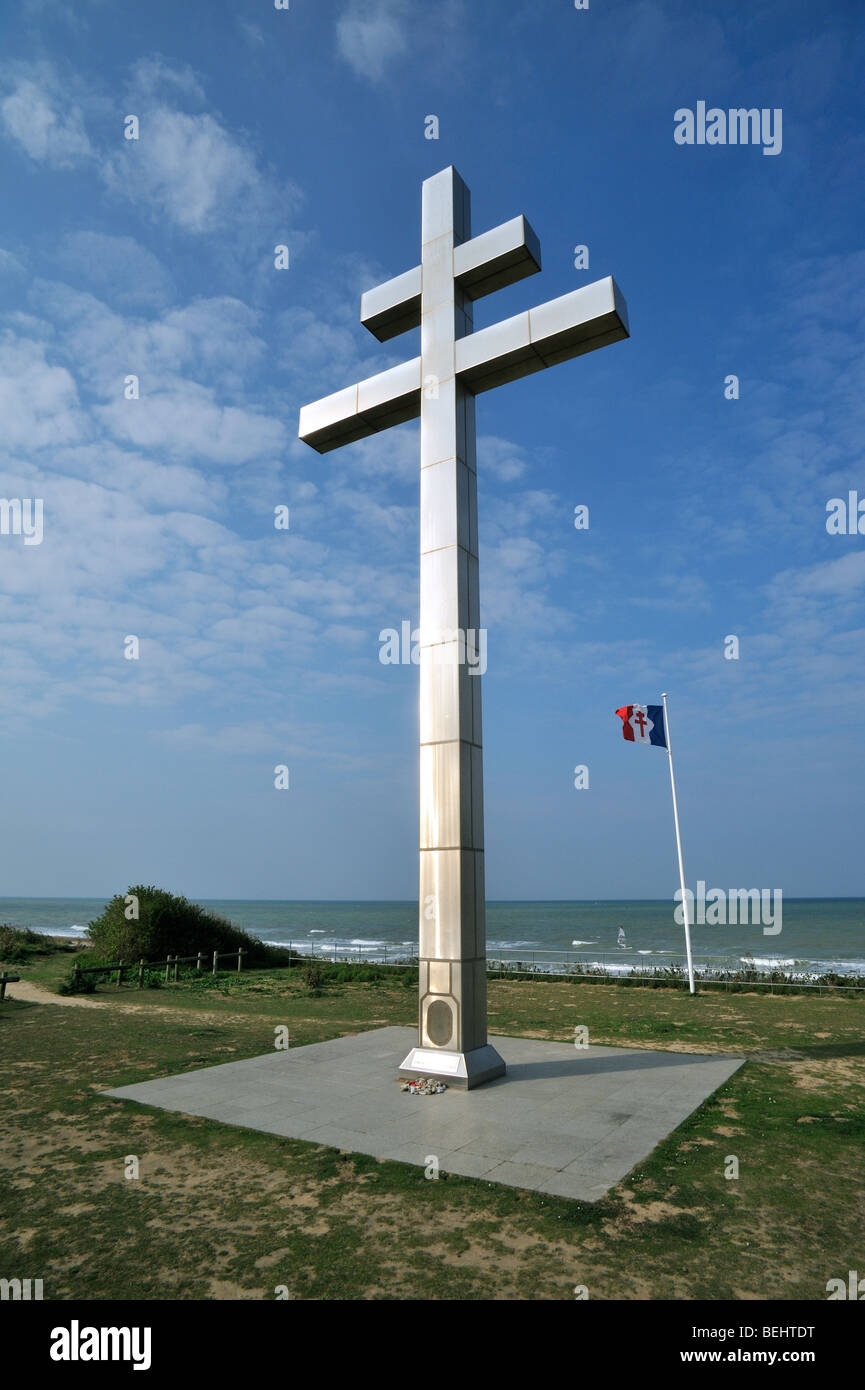 The cross Croix de Lorraine in front of Juno Beach at Courseulles-sur-Mer, Normandy, France Stock Photo