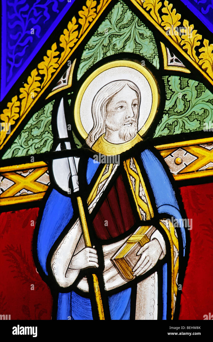 A stained glass window depicting St Matthew the Apostle, All Saints Church, Wighton, Norfolk by Joseph Grant of Costessey Stock Photo