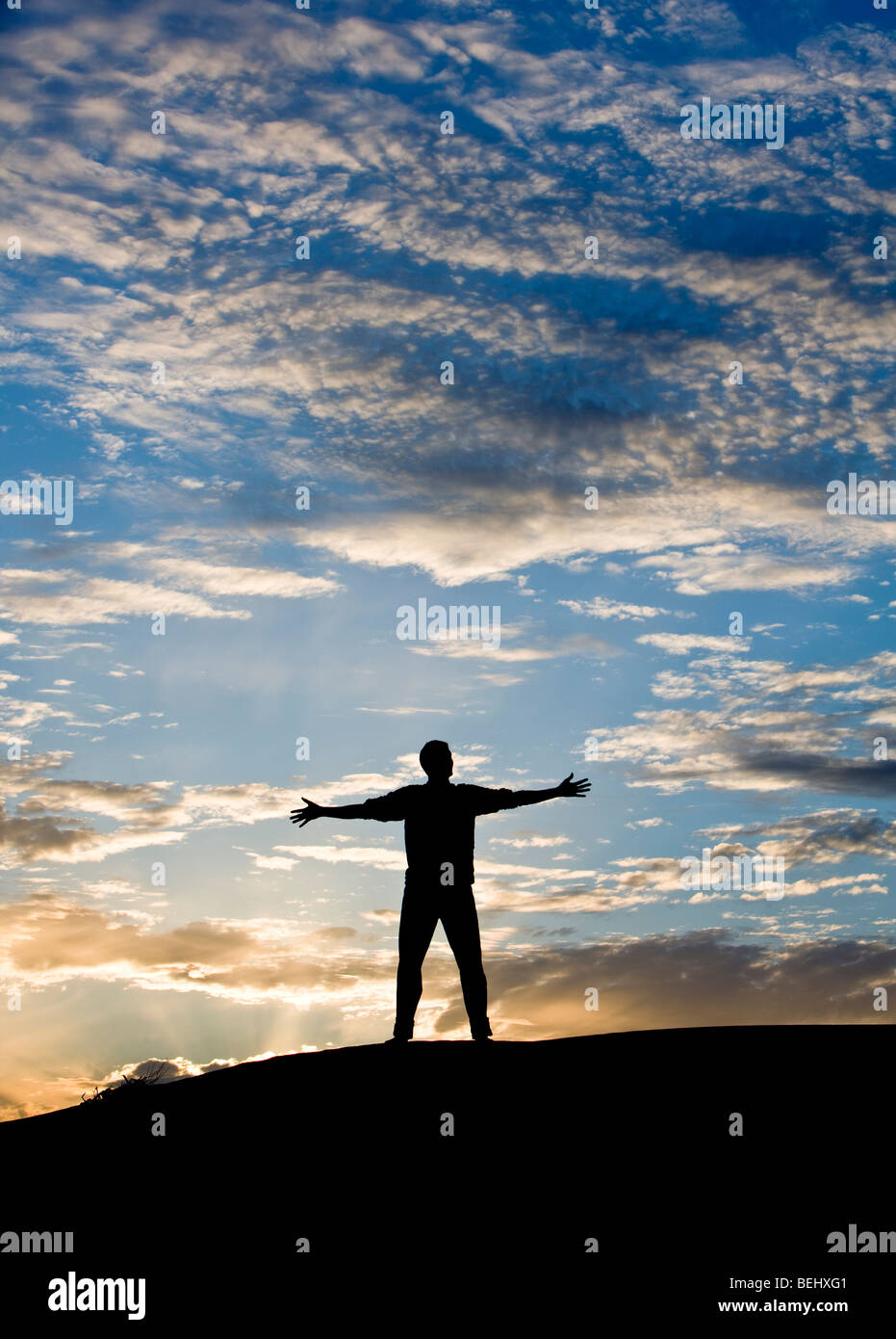 Man silhouetted against the sky hi-res stock photography and images - Alamy