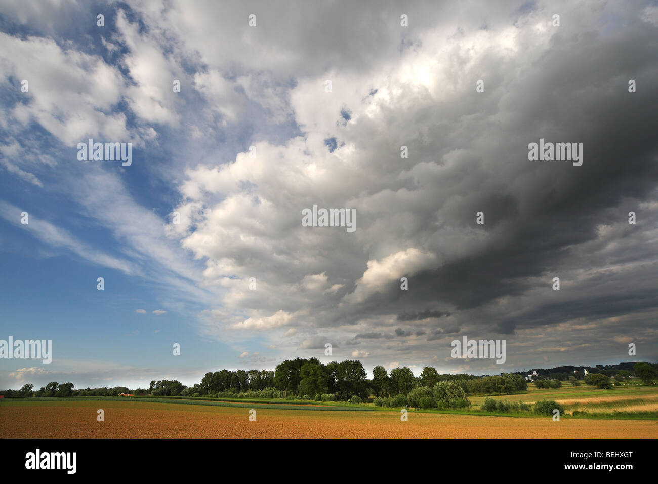 Cloud formations above nature reserve Langemeersen, Belgium Stock Photo