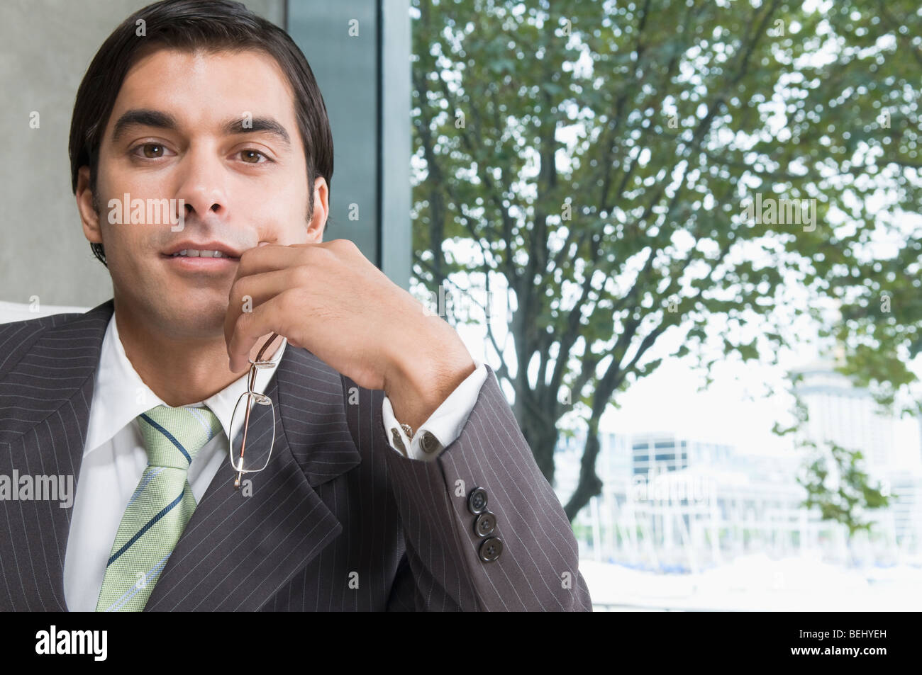 Portrait of a businessman in an office Stock Photo