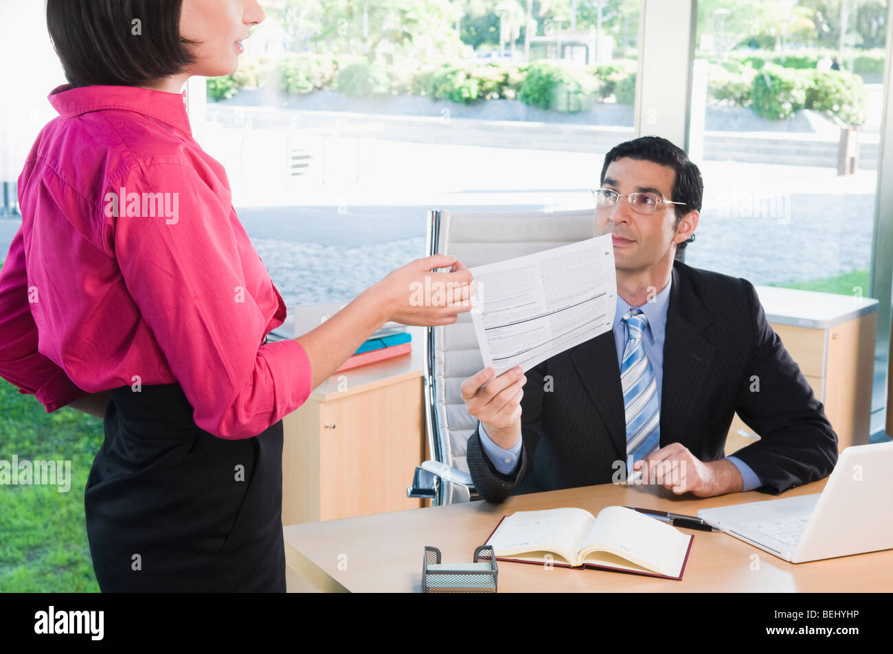 business executives working in an office Stock Photo