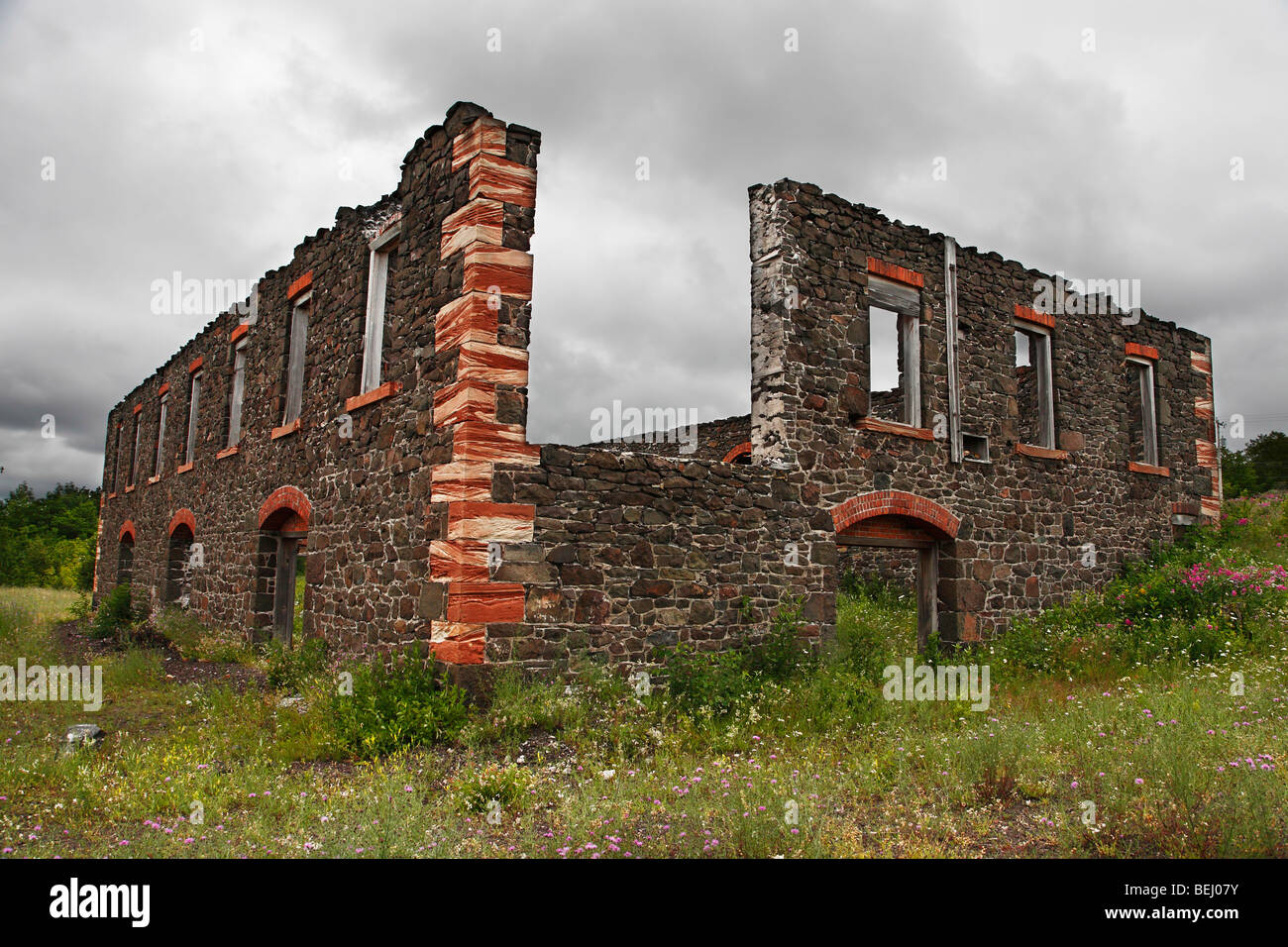Ruins of old Quincy Copper Mine building in Hancock Michigan in USA hi-res Stock Photo