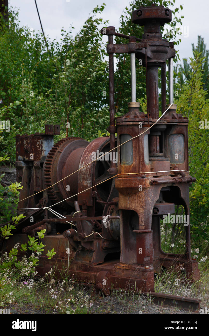 Abandoned old copper mining equipment at Quincy Mine Michigan USA rusty machines hi-res Stock Photo