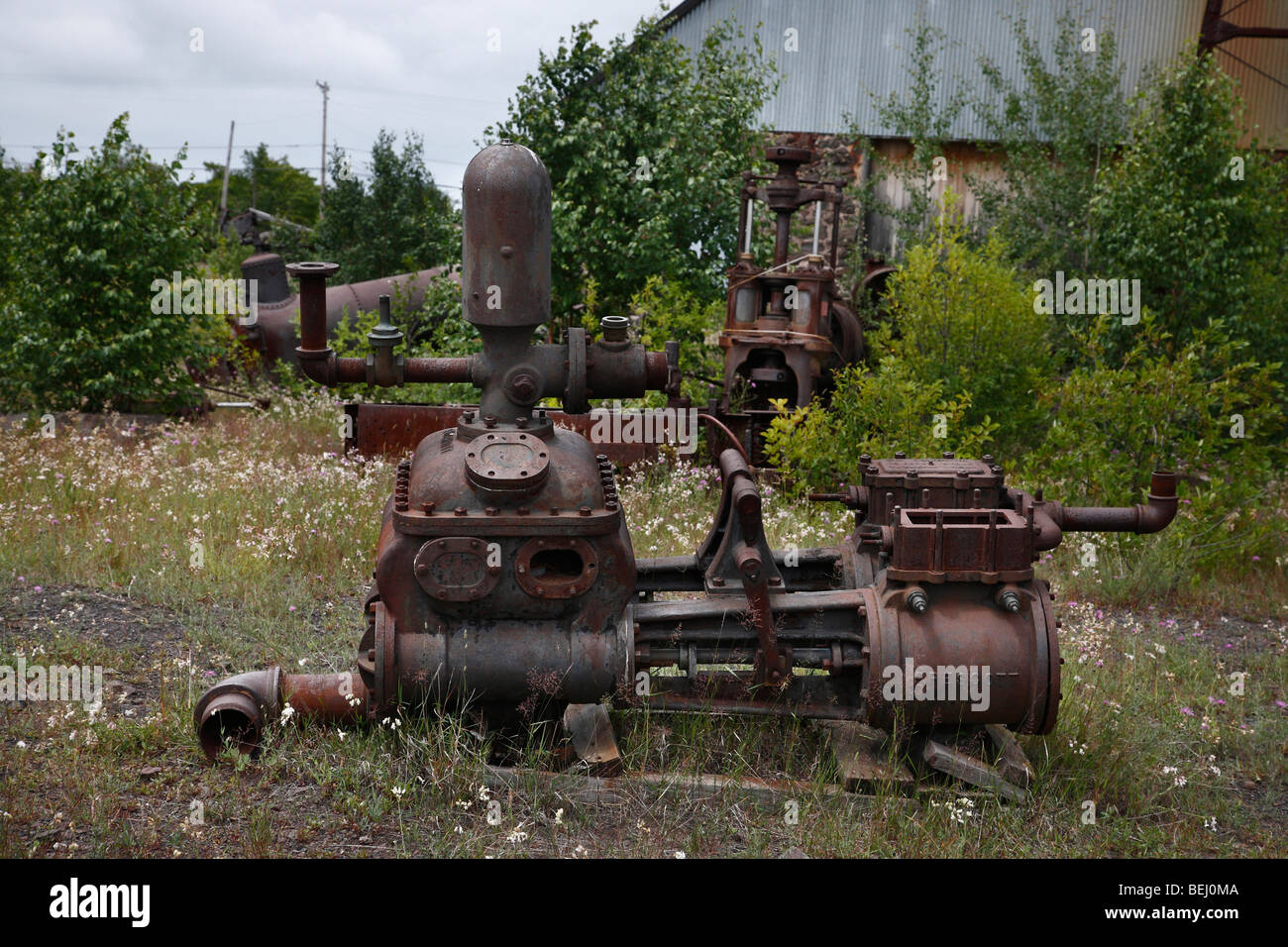 Abandoned mining equipment at Quincy Mine in Hancock Michigan USA rusty machines hi-res Stock Photo