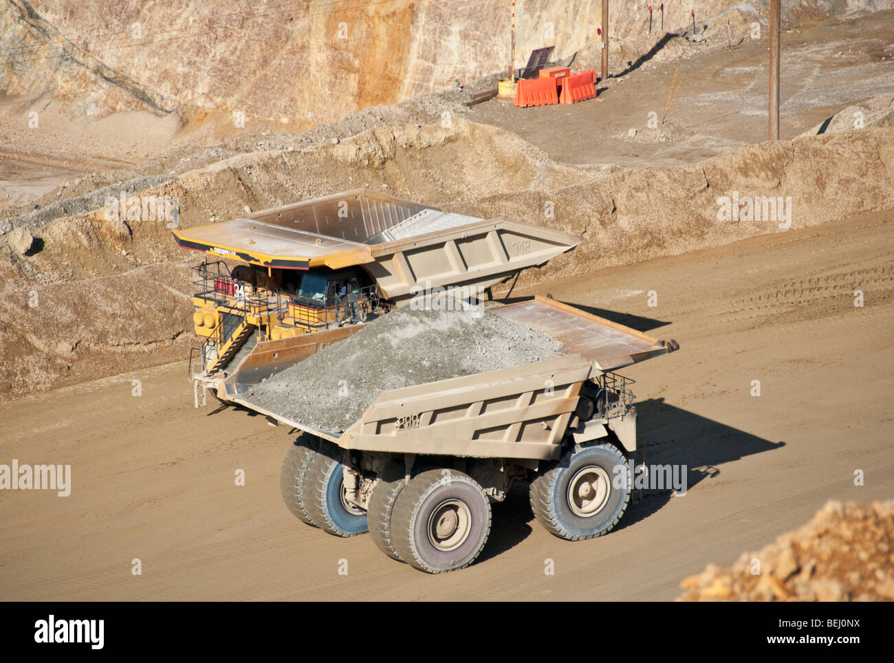 Utah Kennecott Utah Copper Bingham Canyon Mine world's largest man-made excavation haultruck load capacity 255 to 320 tons Stock Photo