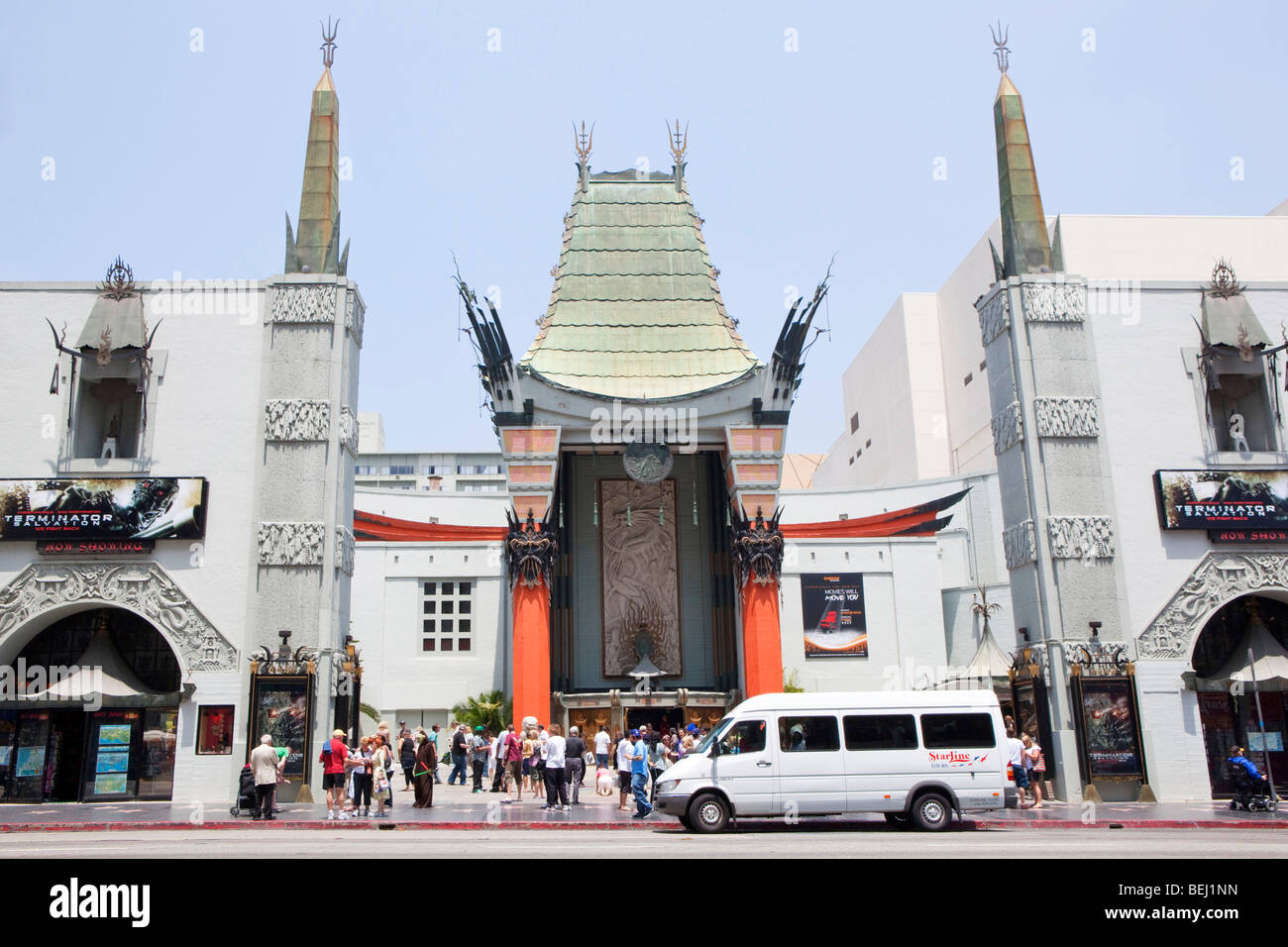 The famous 'Grauman's Chinese Theatre' on Hollywood Boulevard in Los Angeles with a  tourist van parked outside Stock Photo